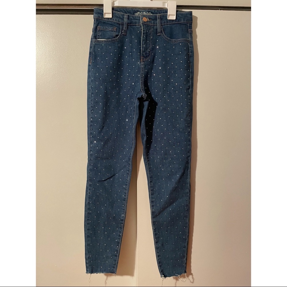 studded blue jeans